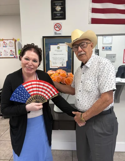 Senior participants celebrating a patriotic activity at Social Center Adult Day Care